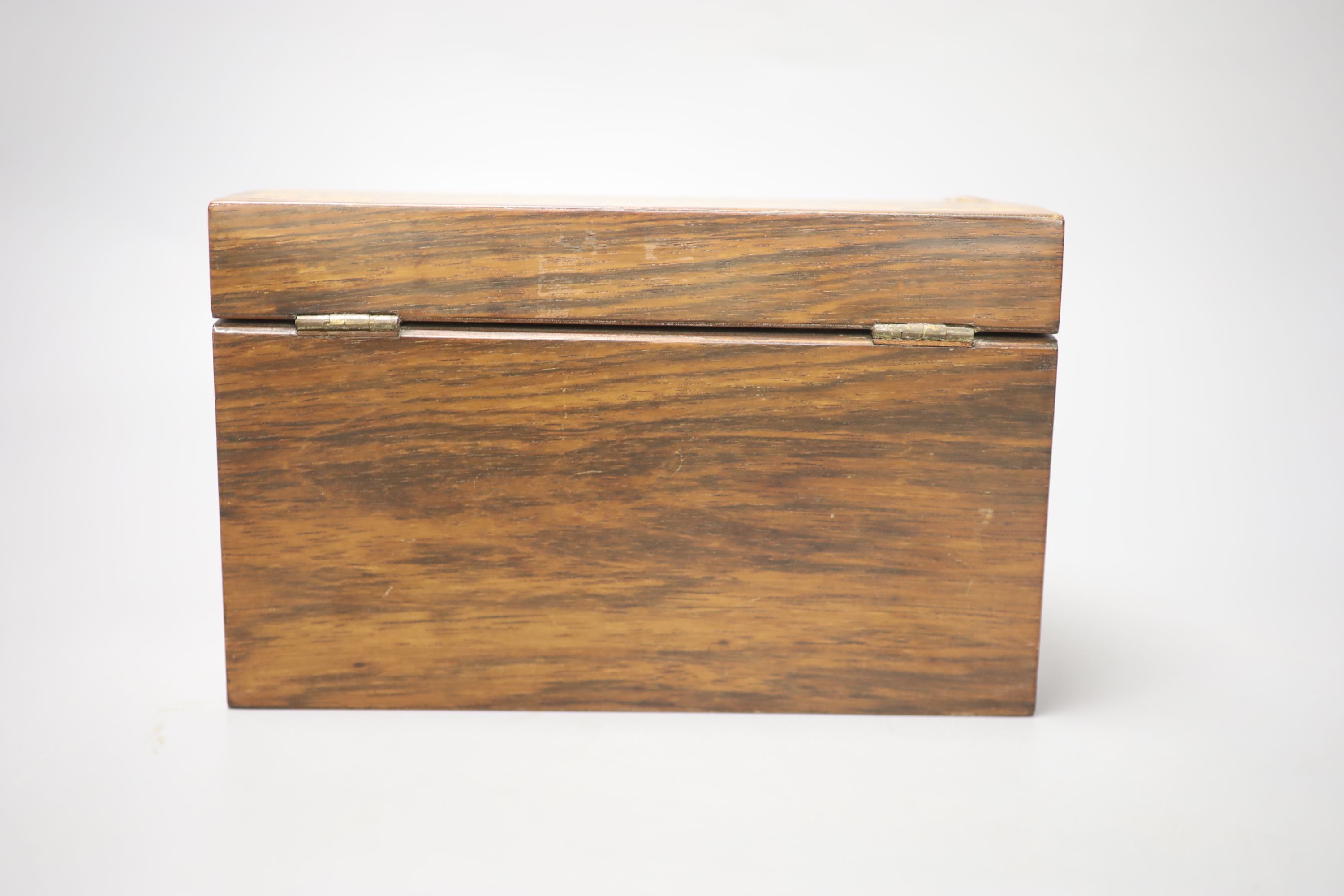 A Tunbridge Ware rosewood stationery box, the hinged sloping top butterfly and satinwood inlaid, W 22cm (max), H 13.5cm D 15cm